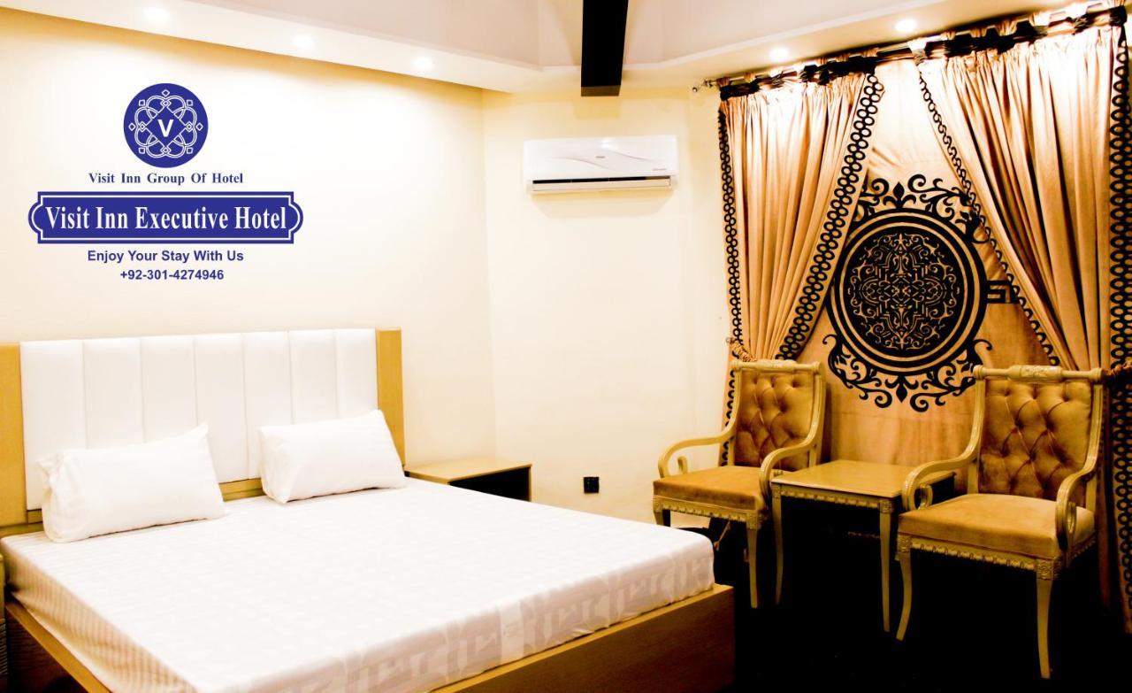 Hotel Visit Inn Executive Lahore Esterno foto