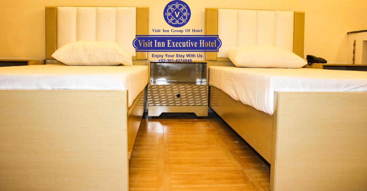Hotel Visit Inn Executive Lahore Esterno foto
