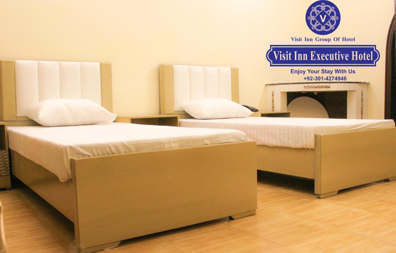 Hotel Visit Inn Executive Lahore Esterno foto