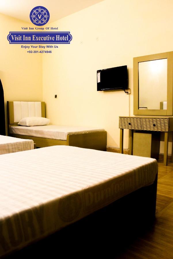 Hotel Visit Inn Executive Lahore Esterno foto