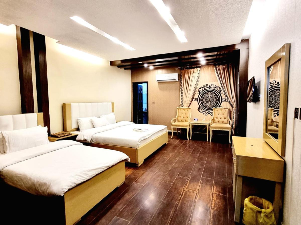Hotel Visit Inn Executive Lahore Esterno foto